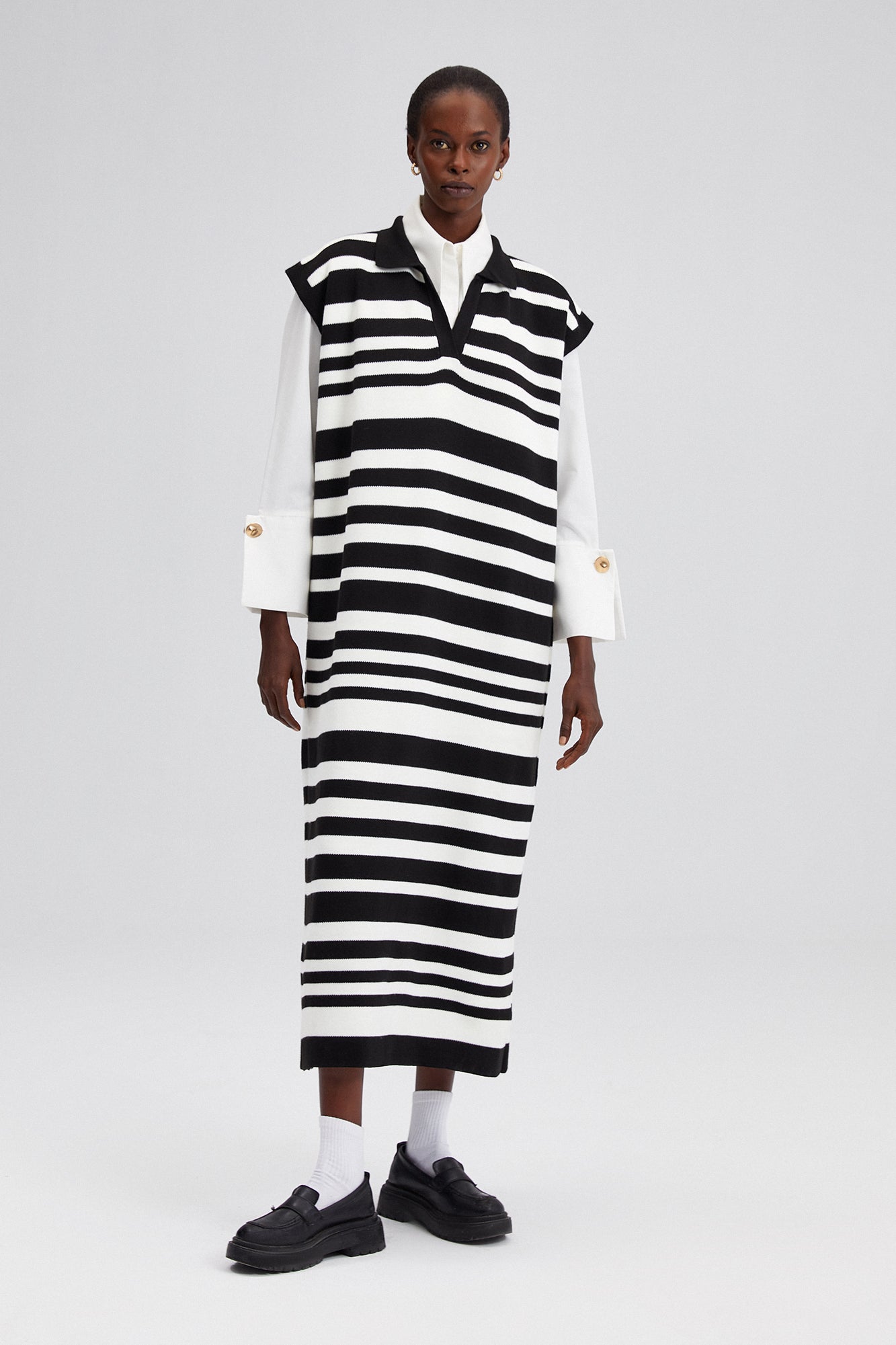 POLO NECK SLEEVELESS STRIPED KNIT DRESS